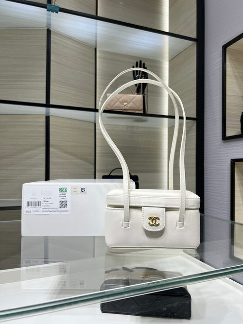 White Chanel mini handbag with top handles and front CC logo
