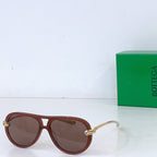 Bottega Veneta sunglasses, reddish-brown frames with dark brown lenses and gold-tone hinges