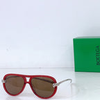 Bottega Veneta sunglasses with red frames and brown-tinted lenses, silver metal arms
