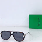 Bottega Veneta sunglasses with dark tortoiseshell frames and charcoal lenses, silver hardware