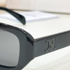 Celine sunglasses side arm with embossed logo on glossy black frame