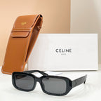 Celine sunglasses with black frames and dark lenses, with tan leather case