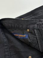 Denim pants with Louis Vuitton Paris fabric label and gold button