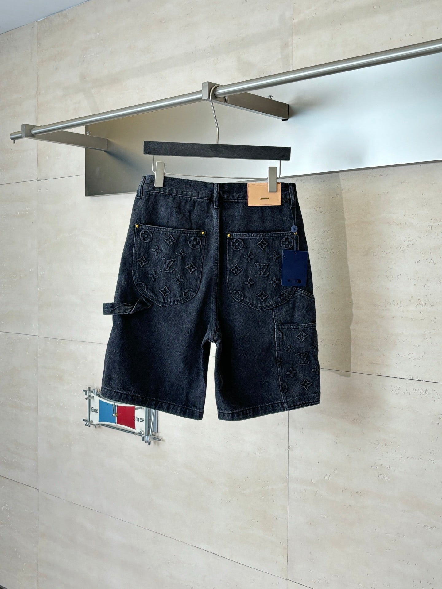 Dark denim Louis Vuitton monogram shorts, rear pockets and waistband with tag