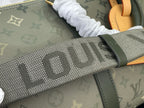 Louis Vuitton monogram fabric strap close-up with dark green trim