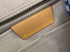 Louis Vuitton Paris leather zipper tag with yellow lace on monogram fabric