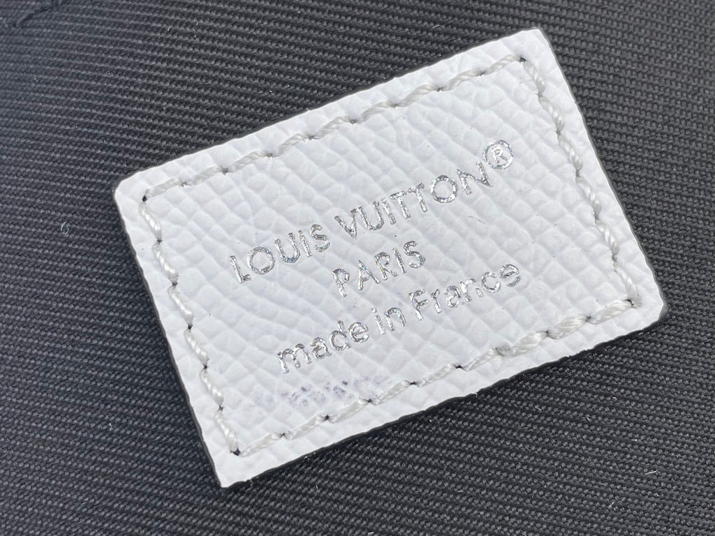 Louis Vuitton bag, white leather with stamped label and Made in France text