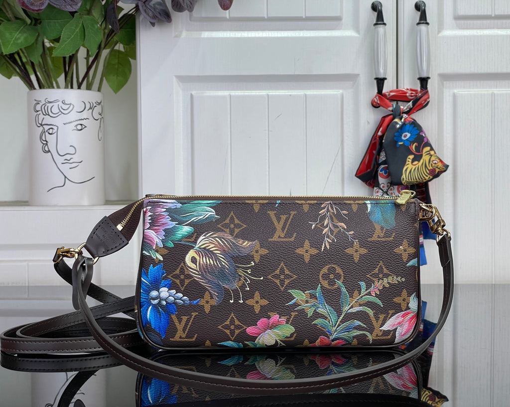 Floral monogram crossbody bag with top zip and gold-tone hardware