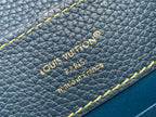 Louis Vuitton Paris leather stamp on blue textured bag with yellow stitching