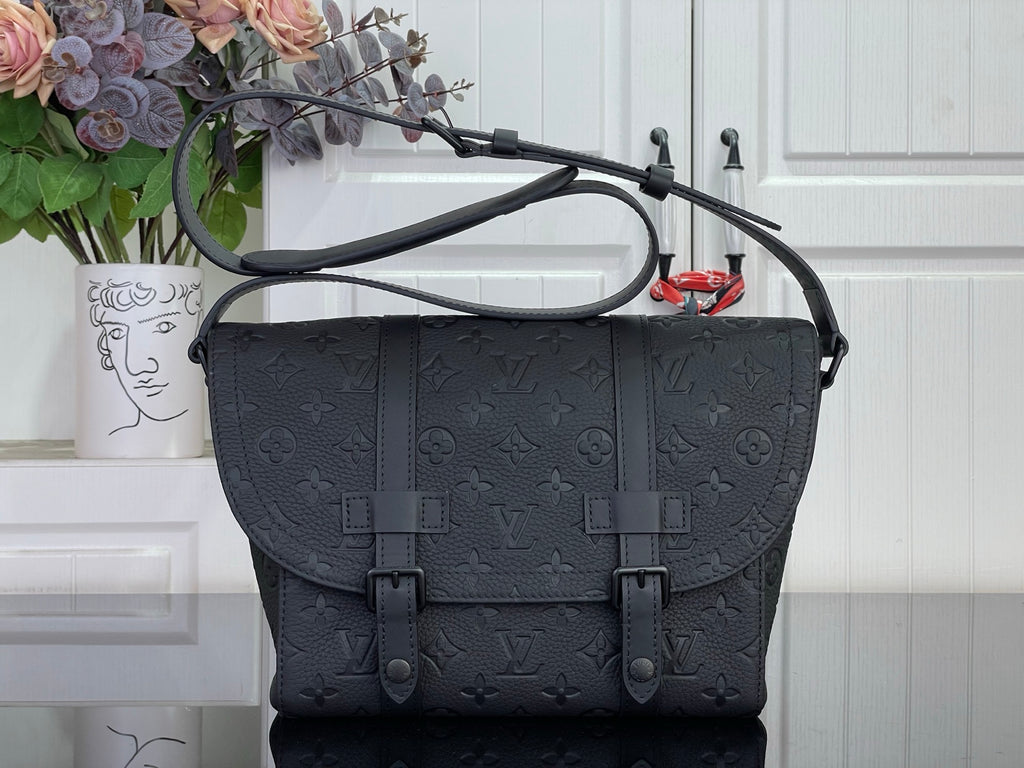 Louis Vuitton satchel bag in dark navy with embossed monogram and top handles