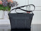 Louis Vuitton shoulder bag in dark navy with front flap pocket and adjustable strap