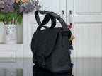 Louis Vuitton crossbody bag in dark navy with flap pocket and adjustable strap