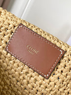 Celine Paris stitched on brown leather tag on woven straw bag