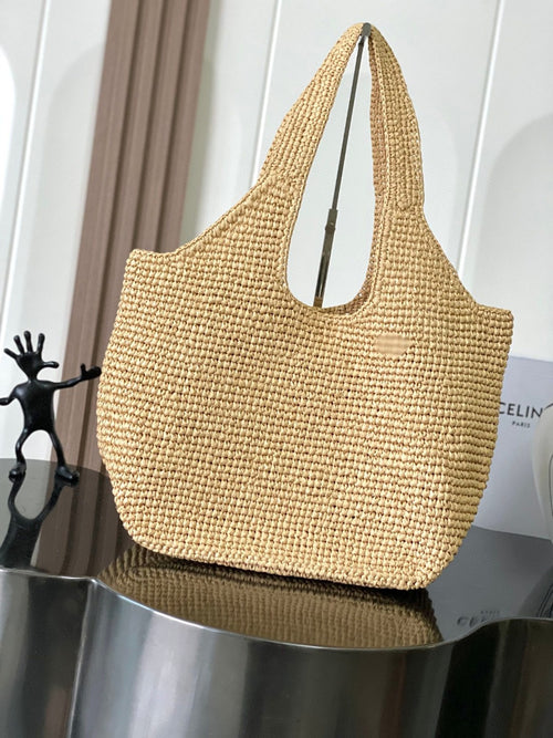 Woven straw tote bag with Celine logo patch and structured top handles