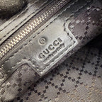 Gucci fabric lining with monogram pattern and Gucci made in Italy label