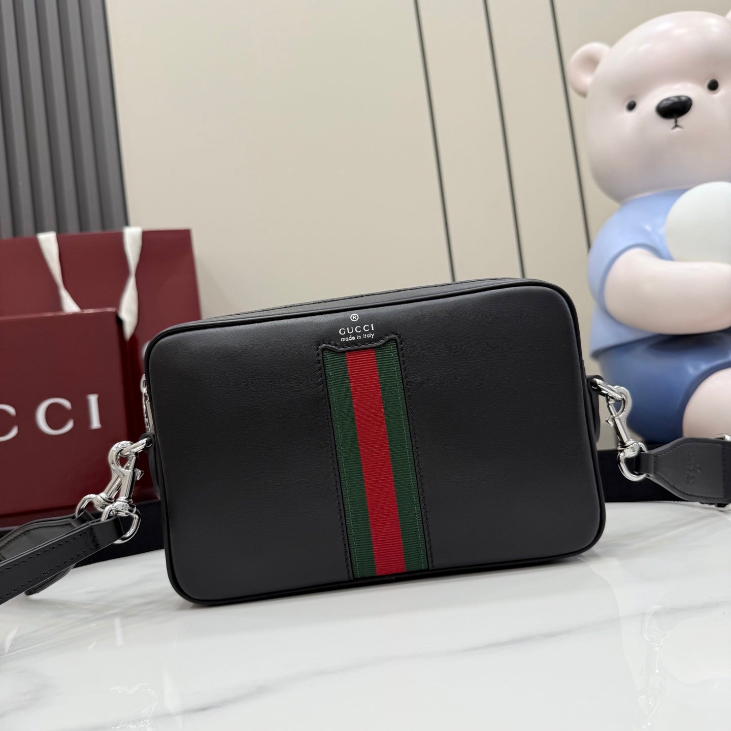 Gucci leather crossbody bag, black with green and red striped web panel