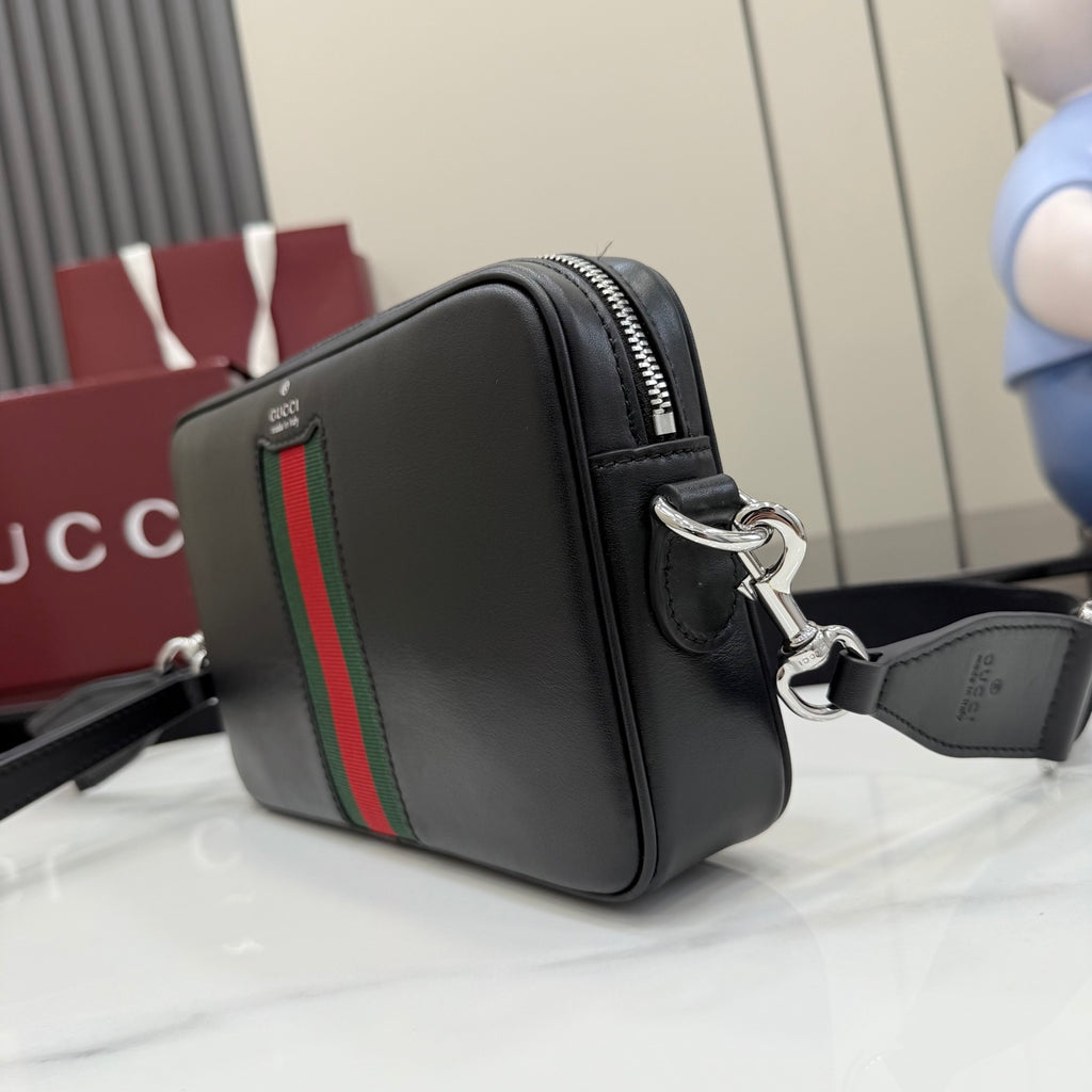 Gucci leather crossbody bag, black with green and red web stripe and zipper