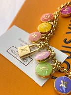 Louis Vuitton small bag charm bracelet with gold chain and colorful round charms