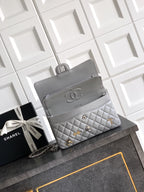 Chanel quilted shoulder bag with chain strap and flap front, light gray