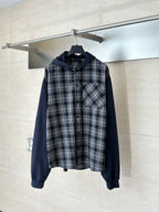 Long-sleeve hooded shirt in dark navy with black-and-white plaid front and pocket