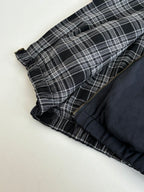 Dark plaid long pants with elastic hem and gathered frill trim
