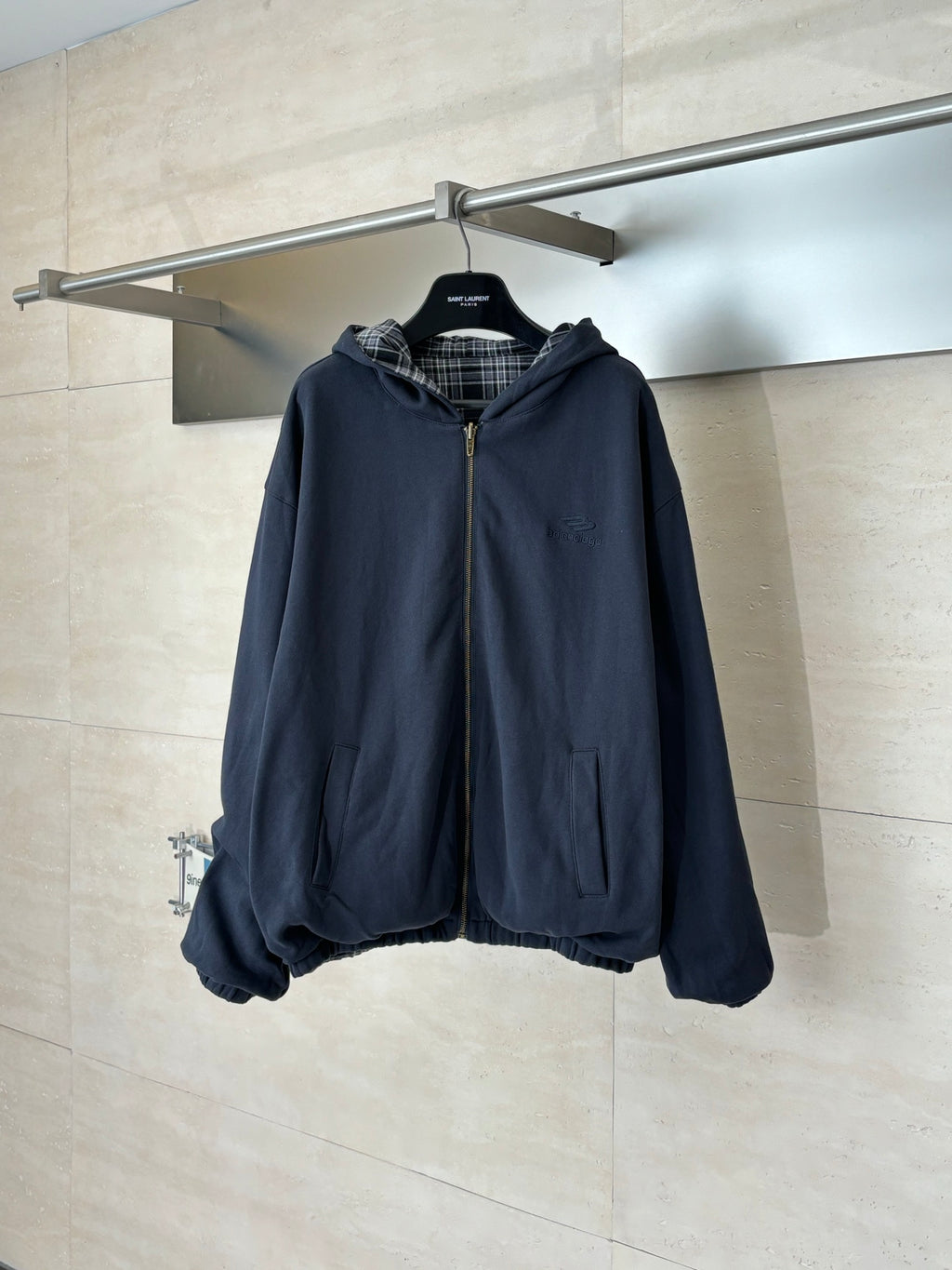 Zip-up hooded jacket in dark navy with front zipper and roomy hood