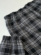 Black and white plaid hooded jacket cuff and drawstring detail