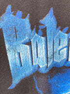 Blue lightning and castle-style graphic print on black T-shirt