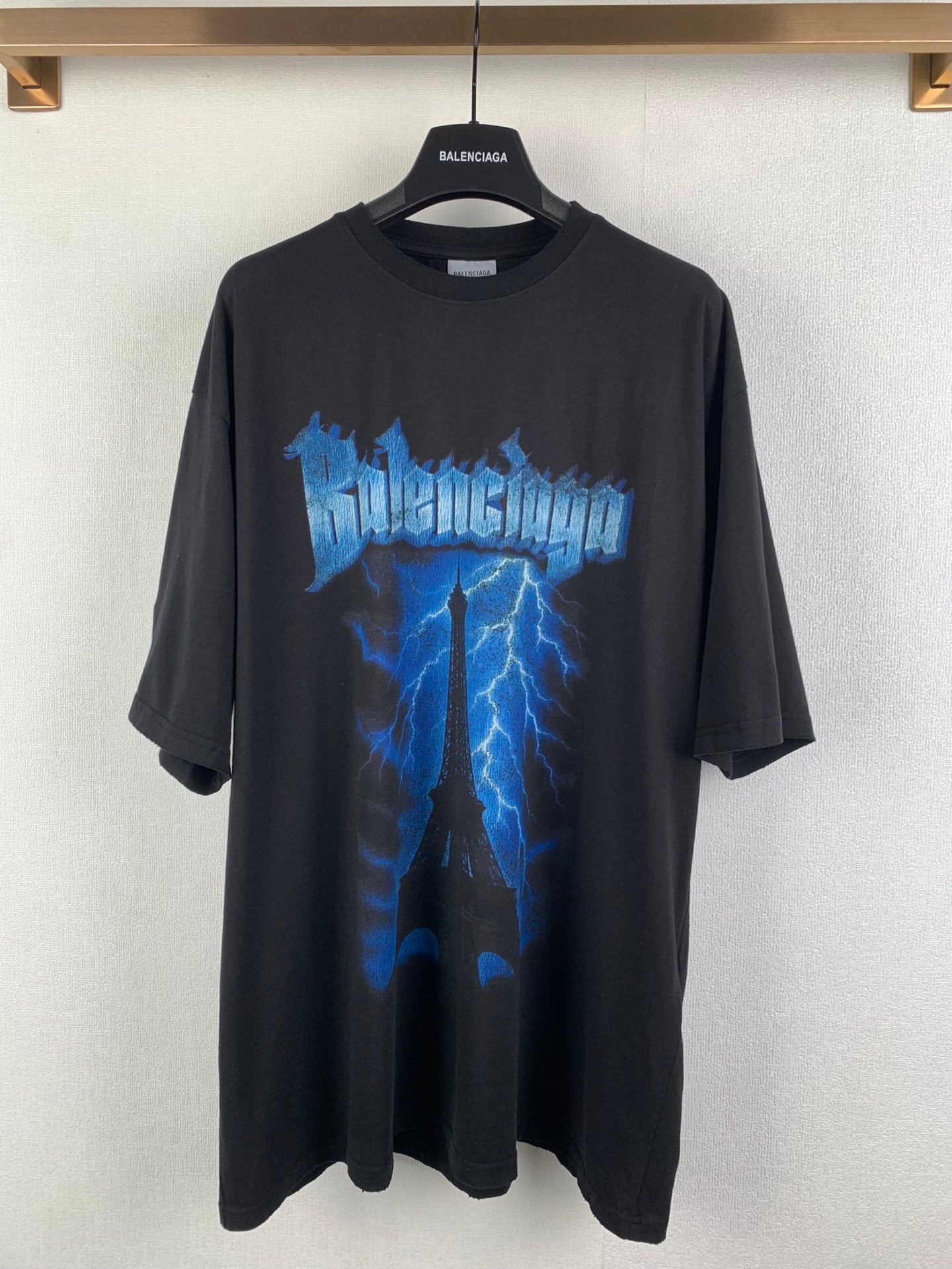 Balenciaga black graphic T-shirt with blue lightning print front, crew neck, short sleeves