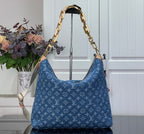 Louis Vuitton monogram hobo bag in blue with gold-tone chain handles