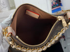 Louis Vuitton monogram crossbody bag with open top and brown fabric interior