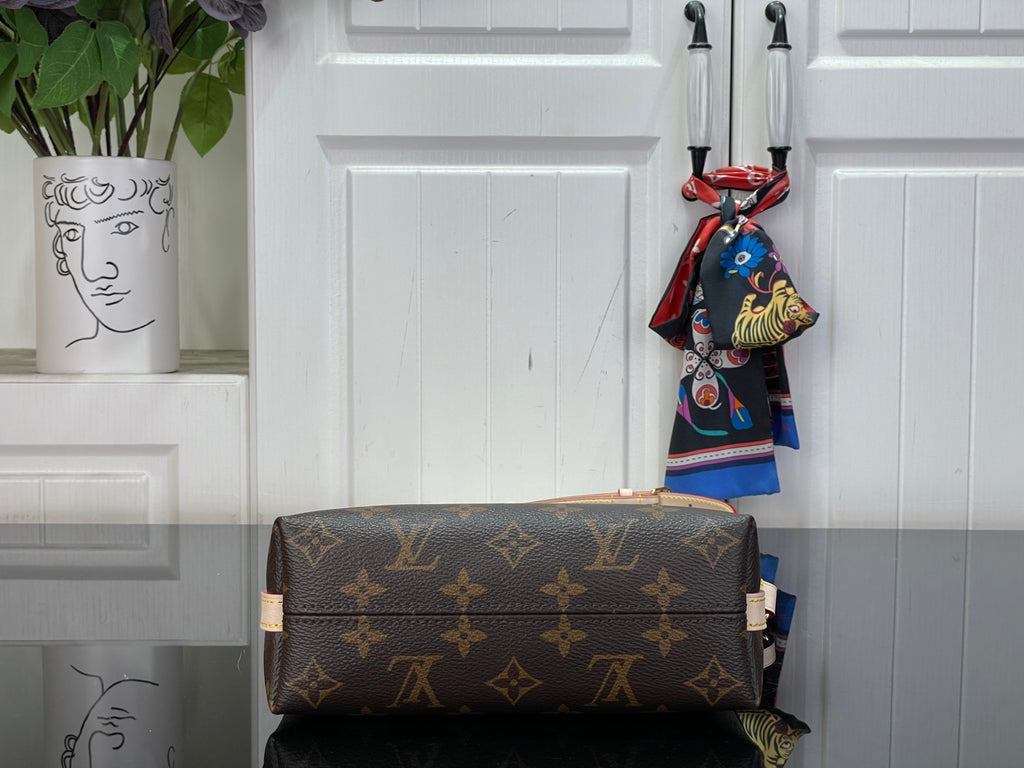 Louis Vuitton monogram top-handle bag in dark brown with gold zipper trim