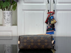 Louis Vuitton monogram top-handle bag in dark brown with gold zipper trim