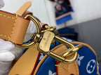 Louis Vuitton blue monogram bag close-up of gold clasp with logo plaque