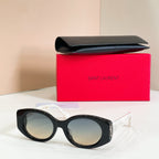 Black round eyeglasses with clear lenses and glossy frame