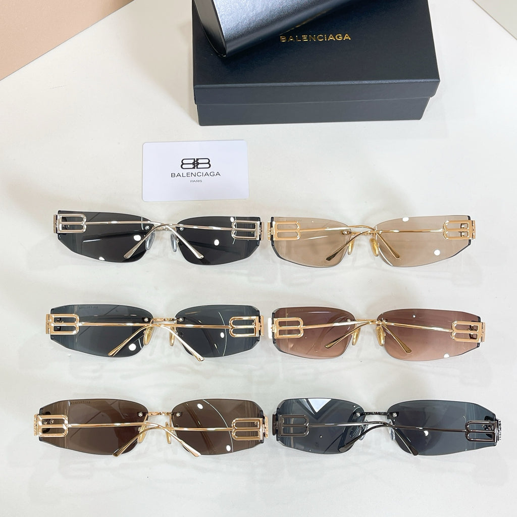 Assorted Balenciaga sunglasses set with gold frames and dark tinted lenses, multiple styles