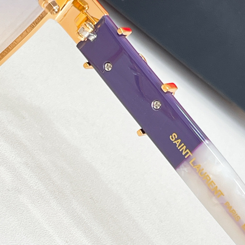 Purple temple arm with SAINT LAURENT text and gold-tone accents