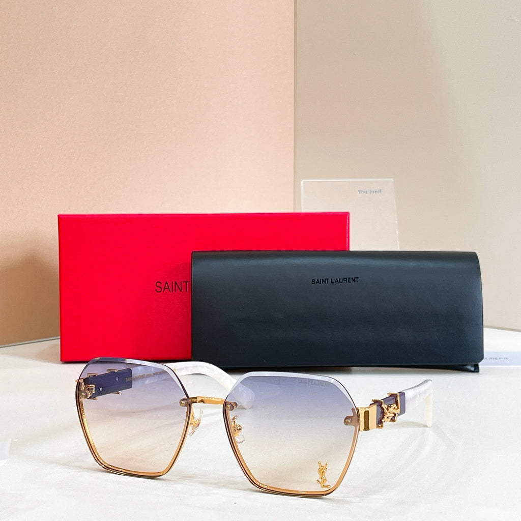 Oversized sunglasses, light purple gradient lenses, gold-tone frame with logo temple detail