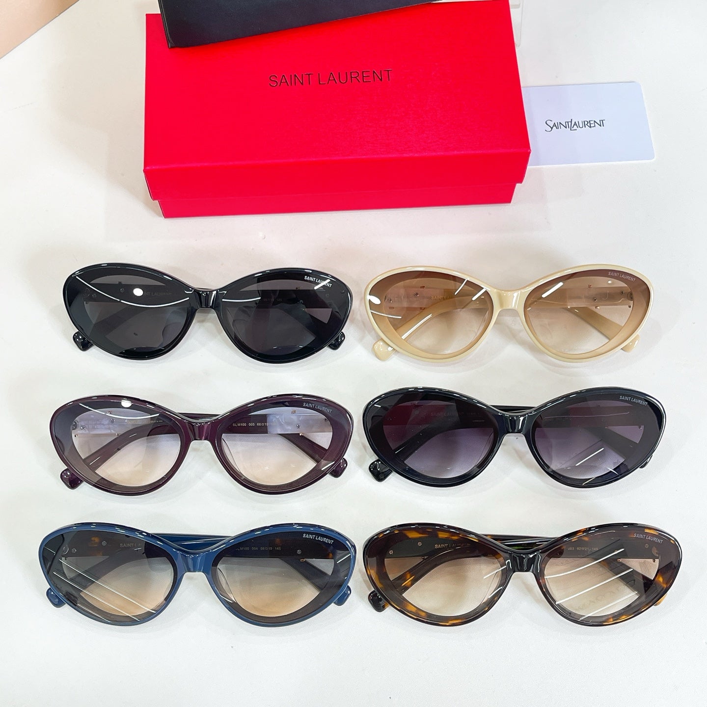 YSL glasses set: four pairs in black, beige, purple, and dark blue