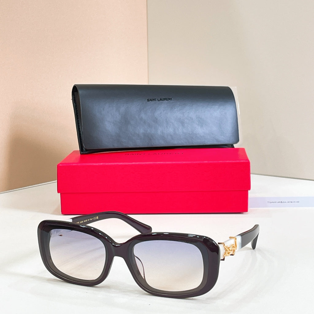 Black rectangular eyeglasses with clear lenses and gold logo detail on temples
