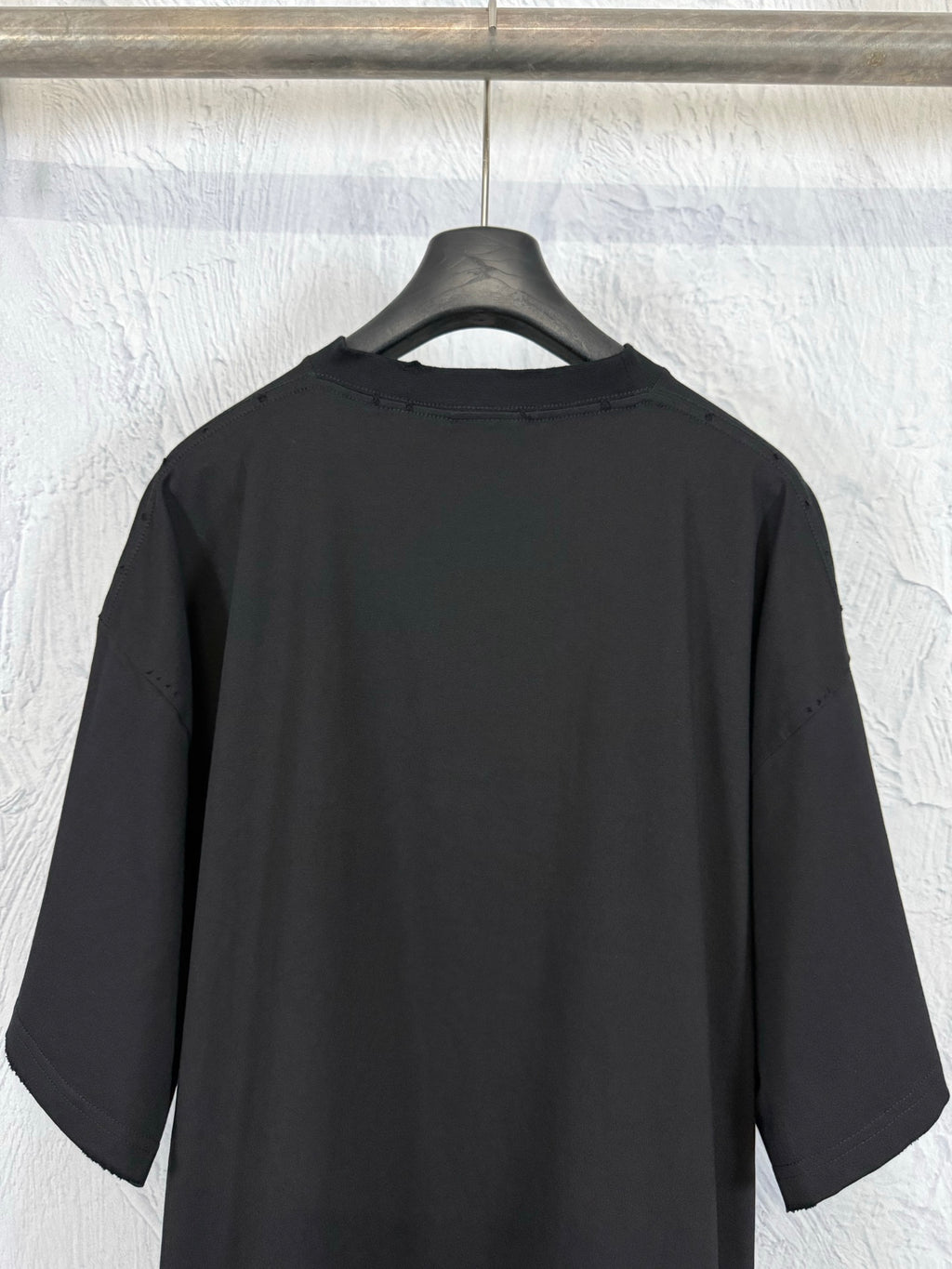 Balenciaga black T-shirt, back view with crew neck and short sleeves