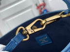 Louis Vuitton bag with blue strap and gold-tone D-ring hardware