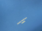 Louis Vuitton blue pebbled leather with embossed “LOUIS VUITTON PARIS” logo
