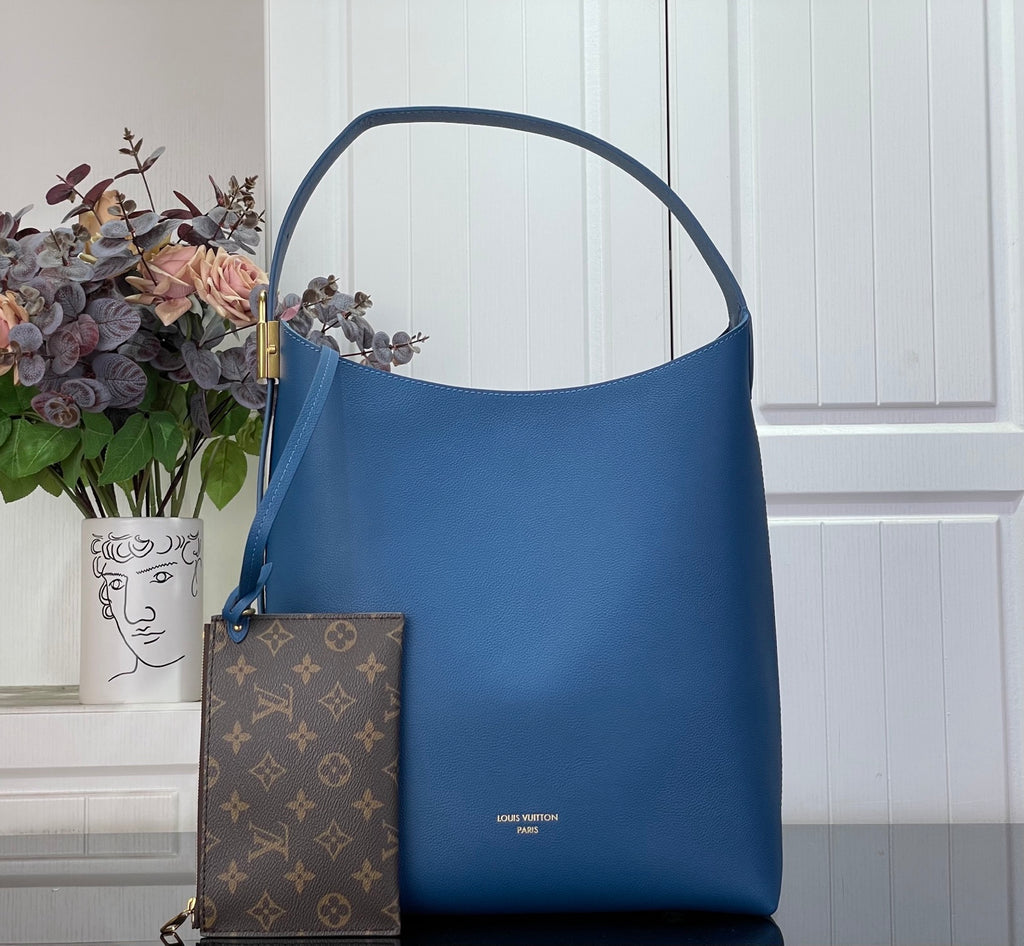 Louis Vuitton blue tote bag with top handle and brown monogram pouch pocket