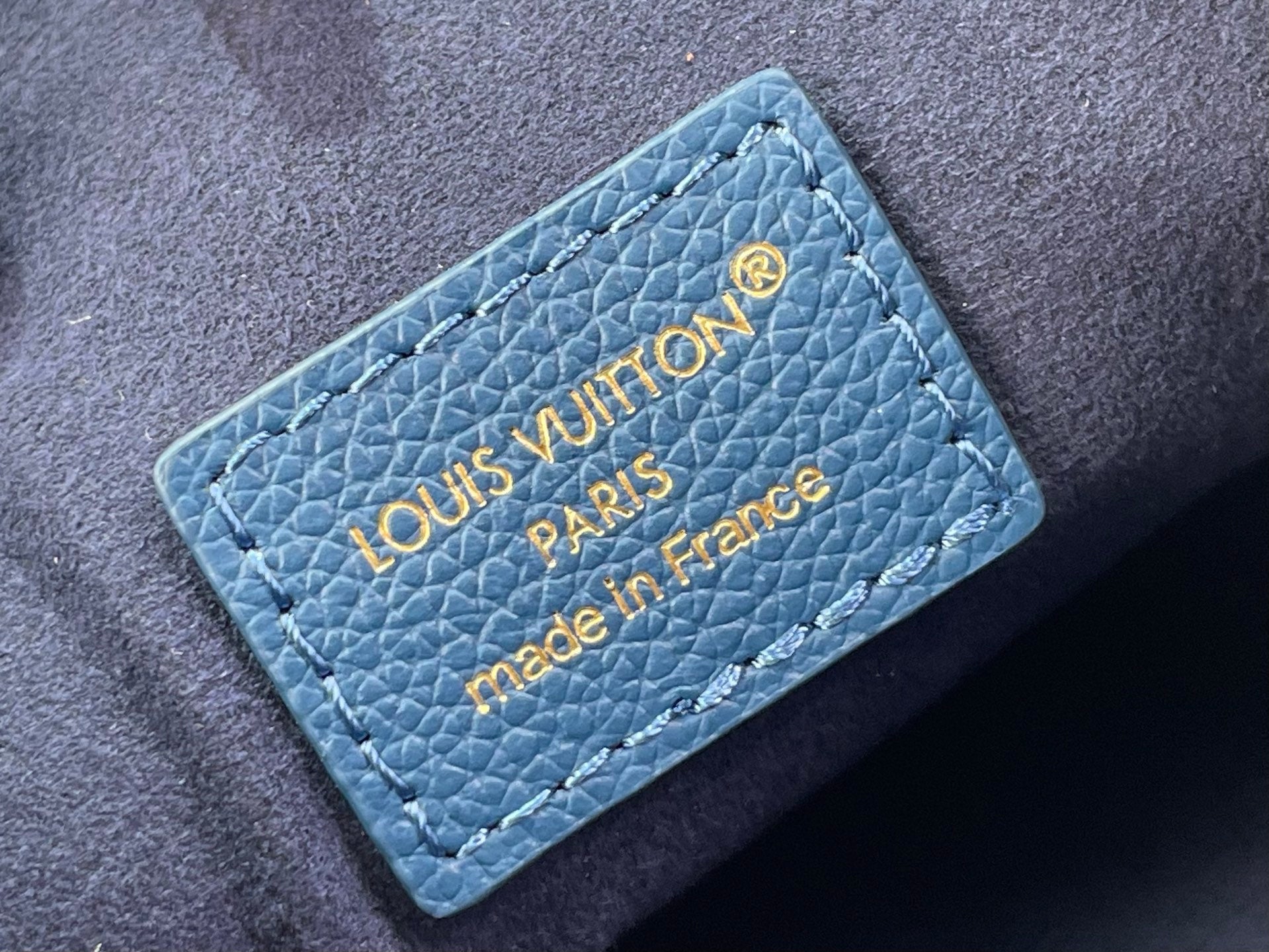 Louis Vuitton blue card holder patch with “LOUIS VUITTON PARIS” and “made in France”