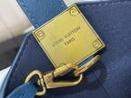 Louis Vuitton blue bag corner with gold plate clasp engraved “LOUIS VUITTON PARIS”