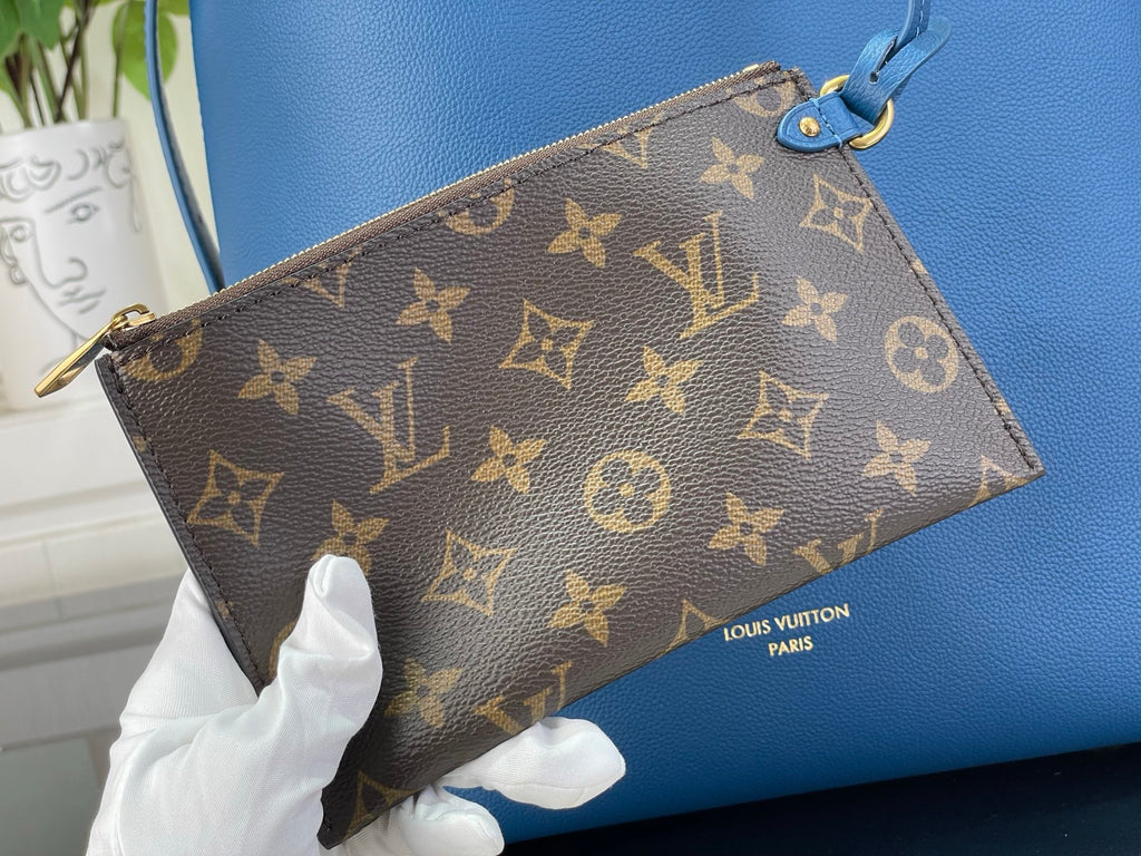 Louis Vuitton monogram wristlet pouch with zipper and blue leather strap