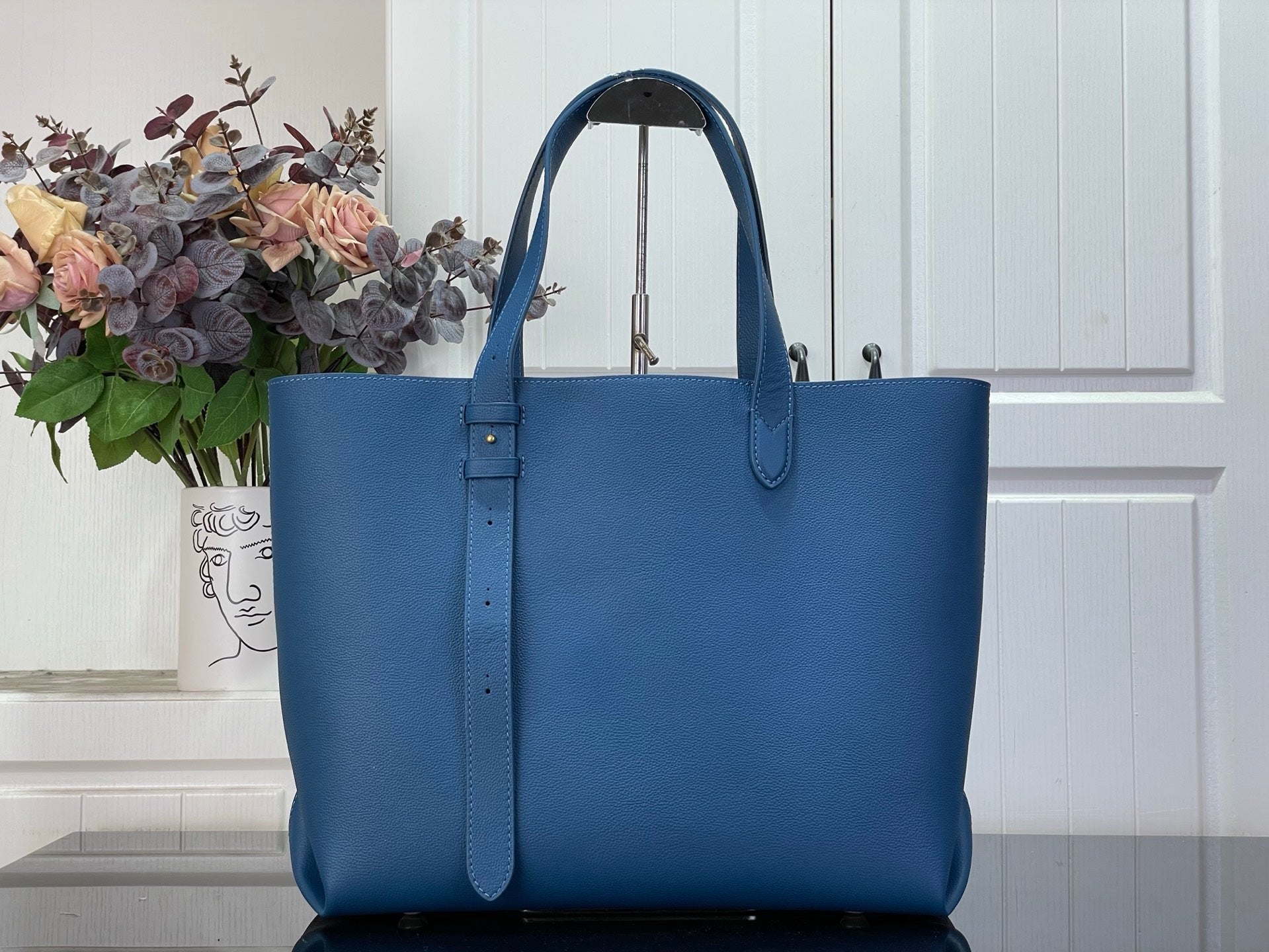 Louis Vuitton blue tote bag with long front strap and open top