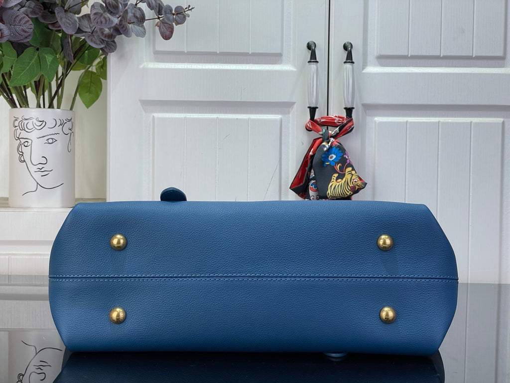 Louis Vuitton blue tote bag base with gold-tone feet and wide top