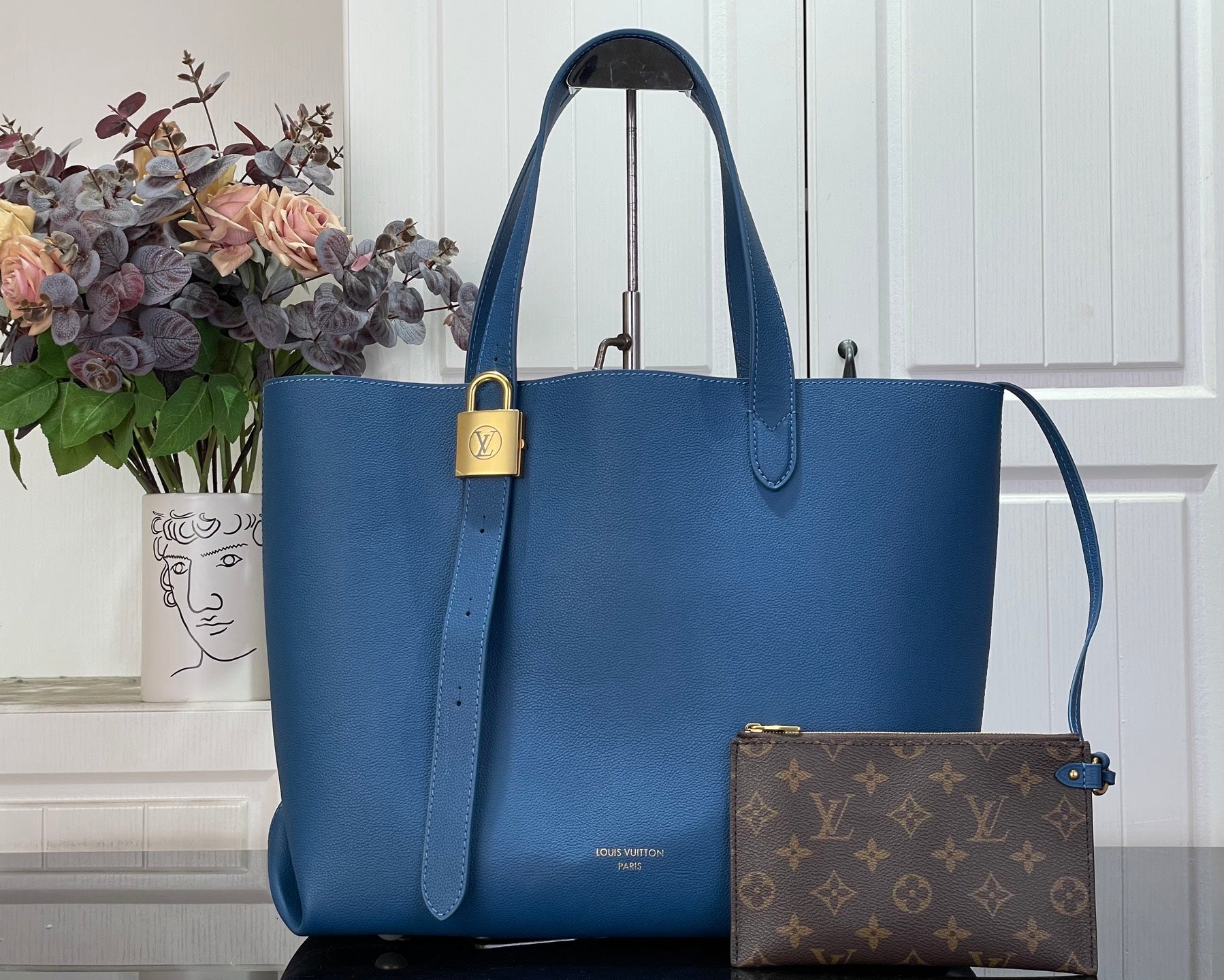 Louis Vuitton blue tote bag with top handles and detachable shoulder strap